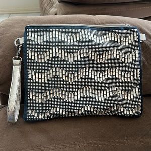 Never been used beautiful blue with rhinestone and silver embellishments clutch